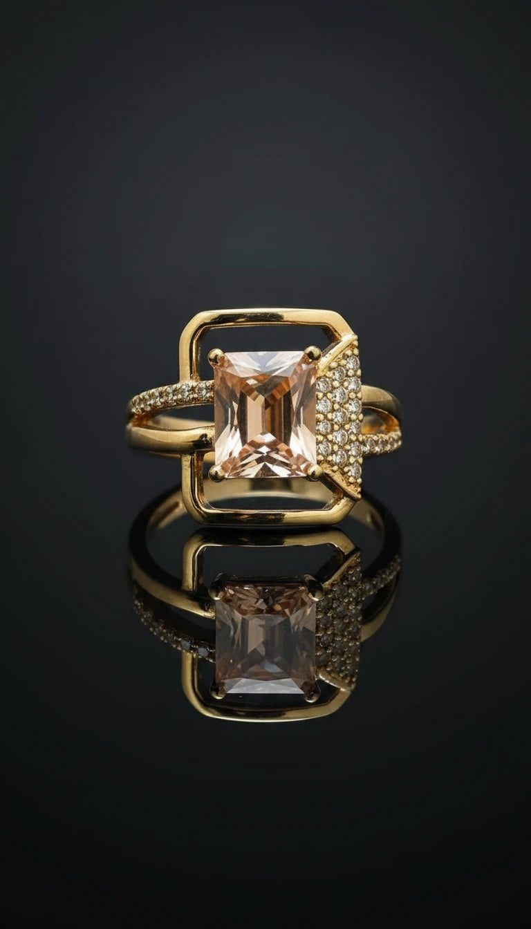 Gold ring featuring a square-cut golden gemstone centerpiece with pavé diamond accents on one side of the band.